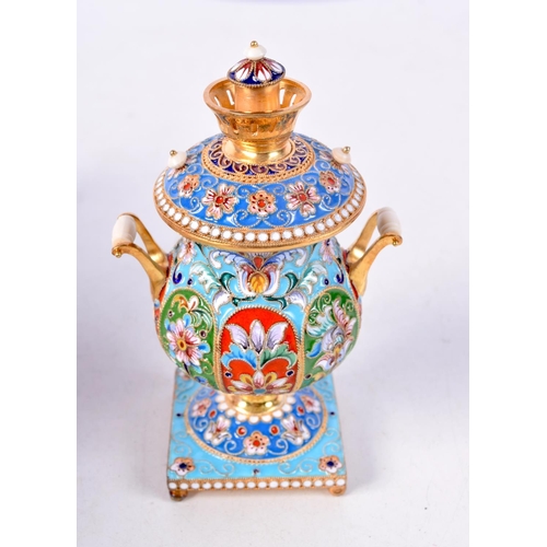 893 - A CONTINENTAL SILVER AND ENAMEL MINIATURE SAMOVAR.  Stamped 84, 10.7cm x 6.1cm, weight 154g