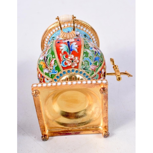 893 - A CONTINENTAL SILVER AND ENAMEL MINIATURE SAMOVAR.  Stamped 84, 10.7cm x 6.1cm, weight 154g