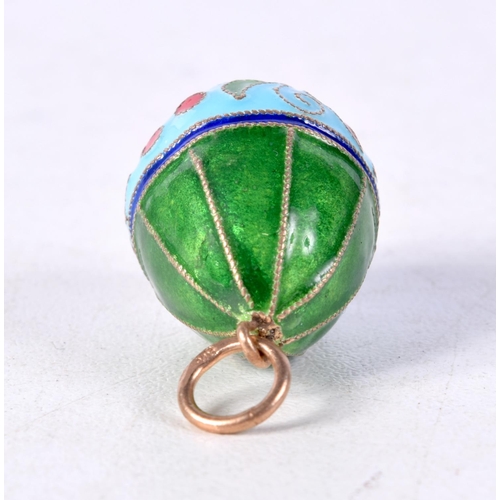 897 - A CONTINENTAL SILVER AND ENAMEL EGG PENDANT.  Stamped 84, 2.5cm x 1.6cm, weight 5.7g