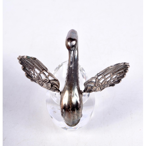 902 - TWO GLASS TABLE SALTS WITH WHITE METAL FITTINGS.  MODELLED AS A DOLPHIN AND A SWAN.  7cm x 7cm x 4cm... 