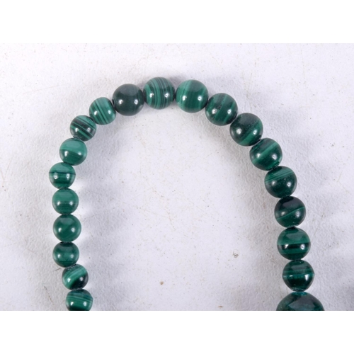 915 - A MALACHITE NECKLACE.  38cm long