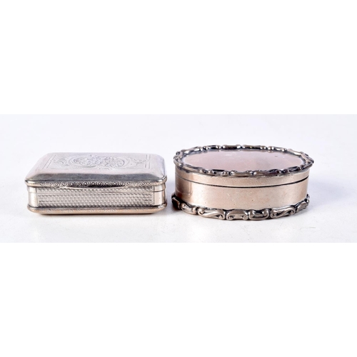 916 - TWO CONTINENTAL SILVER PILL BOXES.  Stamped 800, Largest 2.5cm x 6.4cm, total weight 80.7g