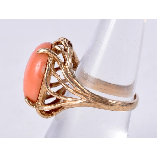 917 - A 10CT GOLD AND CORAL RING.  Stamped 10K, Size L. weight 4.9g