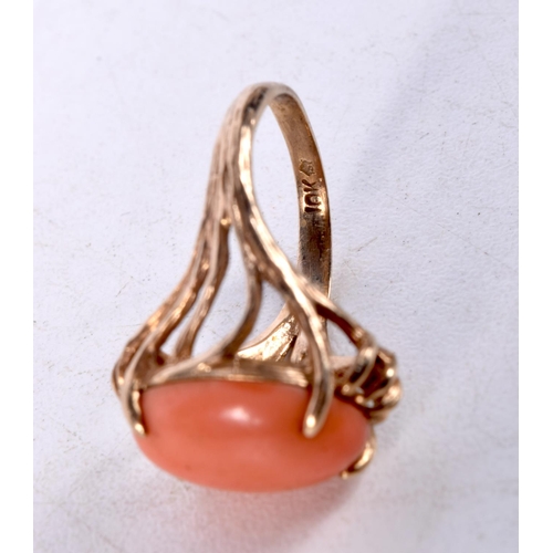 917 - A 10CT GOLD AND CORAL RING.  Stamped 10K, Size L. weight 4.9g