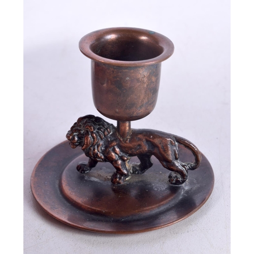 922 - AN UNUSUAL 19TH CENTURY ENGLISH GRAND TOUR LION CHAMBERSTICK. 6.5 cm x 5.25 cm.