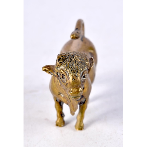 929 - AN 18TH/19TH CENTURY BRONZE FIGURE OF A BULL. 5 cm x 3.25 cm.