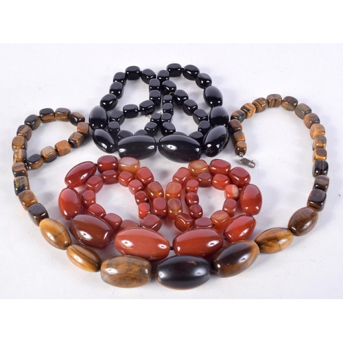 933 - AGATE NECKLACES etc. Largest 77 cm long. (qty)