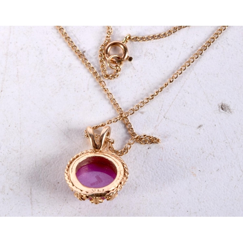 937 - A 14CT GOLD RUBY PENDANT NECKLACE. 3 grams. 45 cm long, pendant 1.5 cm x 1 cm.