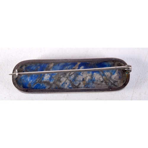 953 - AN ANTIQUE SILVER LAPIS LAZULI BROOCH. 4.5 cm x 1.5 cm.