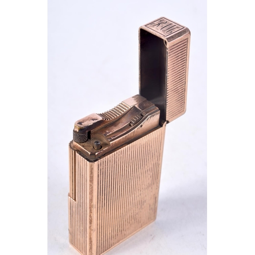 960 - A ST DUPONT YELLOW METAL LIGHTER. 5.75 cm x 3.5 cm.