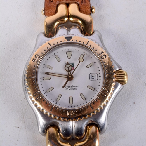 963 - A LADIES TAGHEUR WRISTWATCH. 3 cm wide inc crown.