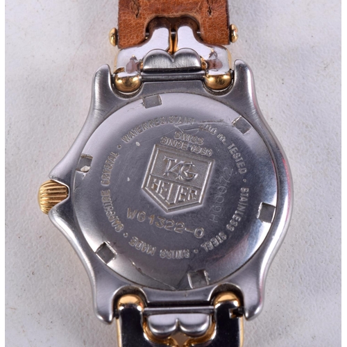 963 - A LADIES TAGHEUR WRISTWATCH. 3 cm wide inc crown.