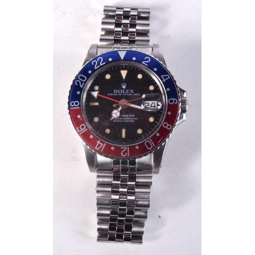 972 - A VINTAGE ROLEX PEPSI GMT MASTER 16750 BOXED WRISTWATCH. 4.25 cm wide inc crown.