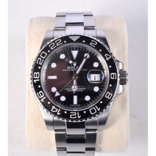 973 - A ROLEX GMT MASTER II BOXED 116710LN WRISTWATCH. 4.5 cm wide inc crown.