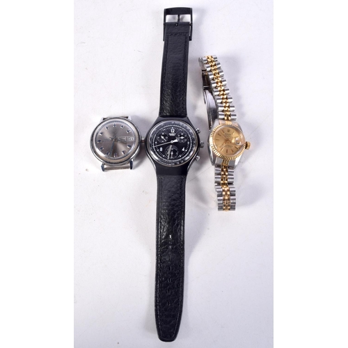 980 - THREE WATCHES. 4 cm wide. (3)