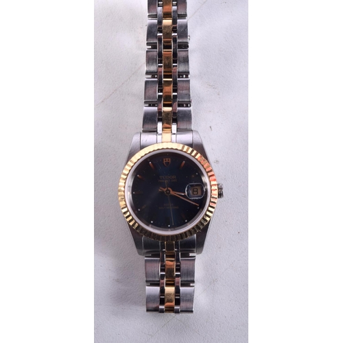 981 - A LADIES TUDOR TWO TONE BLUE DIAL WRISTWATCH. 2.5 cm wide.