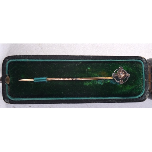 984 - A VICTORIAN 15CT GOLD STICK PIN. 1.2 grams. 6 cm long.