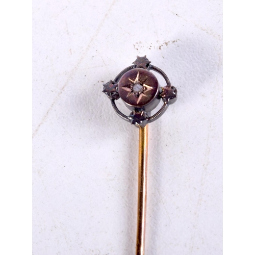 984 - A VICTORIAN 15CT GOLD STICK PIN. 1.2 grams. 6 cm long.