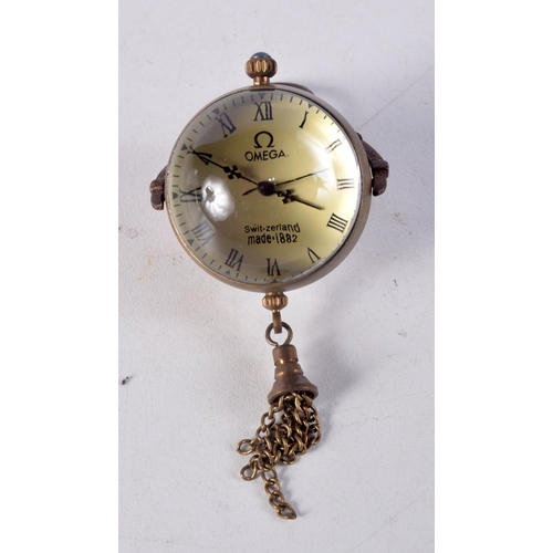 987 - A CONTEMPORARY BALL CLOCK. 8.5 cm wide.