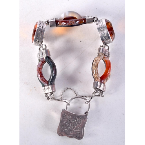 999 - A VINTAGE SCOTTISH SILVER HARDSTONE BRACELET. 36 grams. 5 cm internal width.