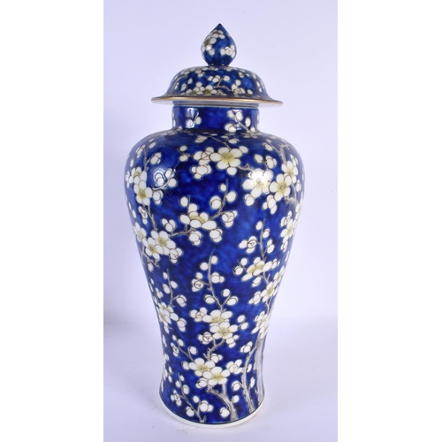 1500 - A LARGE EARLY 20TH CENTURY JAPANESE MEIJI PERIOD MIDNIGHT BLUE VASE AND COVER painted with flowers. ... 