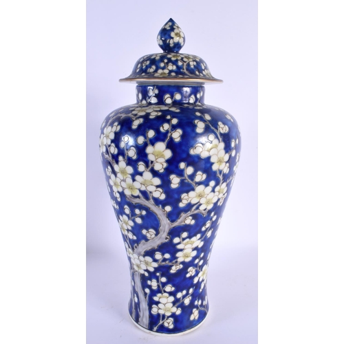 1500 - A LARGE EARLY 20TH CENTURY JAPANESE MEIJI PERIOD MIDNIGHT BLUE VASE AND COVER painted with flowers. ... 