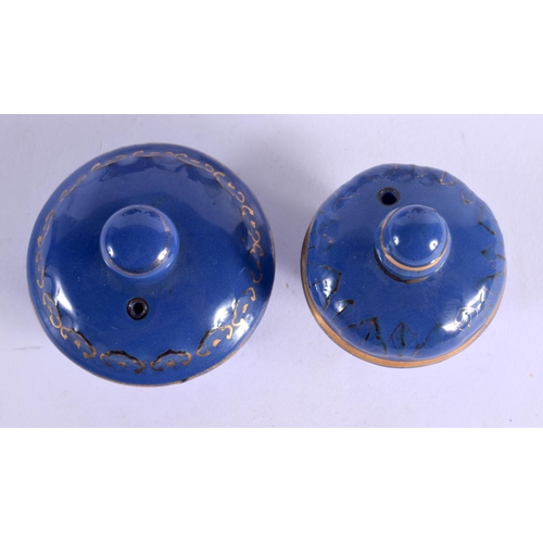 1501 - AN UNUSUAL PAIR OF JAPANESE TAISHO PERIOD NIKKI COMPANY LTD POTTERY TEAPOTS decorated with figures. ... 