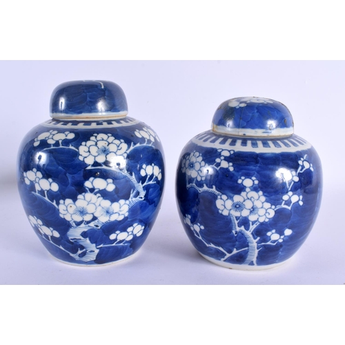 1502 - TWO 19TH CENTURY CHINESE BLUE AND WHITE PORCELAIN GINGER JARS AND COVERS. Largest 15 cm high. (2)