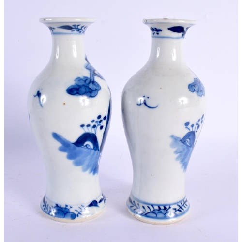 1503 - A PAIR OF 19TH CENTURY CHINESE BLUE AND WHITE PORCELAIN VASES Kangxi style. 15 cm high.