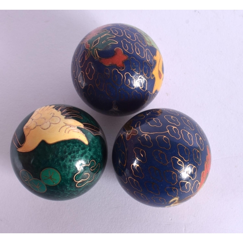 1504 - THREE UNUSUAL CLOISONNE ENAMEL BELL BALLS. 5 cm diameter. (3)