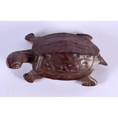 1506 - AN EARLY 20TH CENTURY JAPANESE MEIJI PERIOD CARVED BOXWOOD OKIMONO modelled as a tortoise. 9 cm wide... 