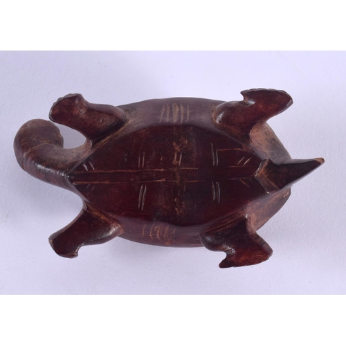 1506 - AN EARLY 20TH CENTURY JAPANESE MEIJI PERIOD CARVED BOXWOOD OKIMONO modelled as a tortoise. 9 cm wide... 