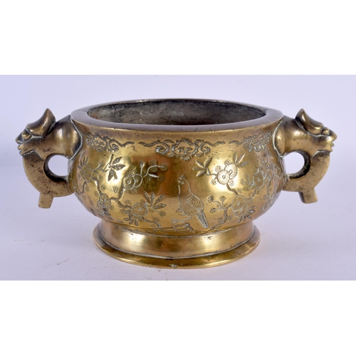 1510 - A 19TH CENTURY CHINESE TWIN HANDLED BRONZE CENSER Qing, decorated with birds and foliage. 17 cm wide... 