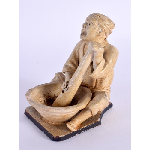 1519 - A LATE 19TH CENTURY JAPANESE MEIJI PERIOD POTTERY FIGURE OF A MALE modelled washing clothes. 7 cm x ... 