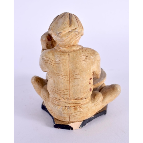 1519 - A LATE 19TH CENTURY JAPANESE MEIJI PERIOD POTTERY FIGURE OF A MALE modelled washing clothes. 7 cm x ... 