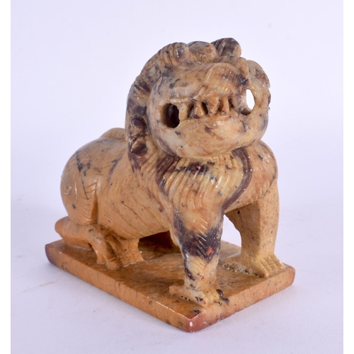 1520 - A 19TH CENTURY CHINESE CARVED SOAPSTONE FIGURE OF A BUDDHISTIC BEAST Qing. 8 cm x 8 cm.