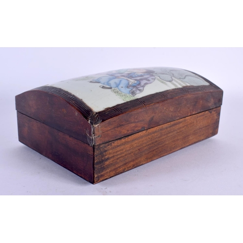 1522 - AN EARLY 20TH CENTURY CHINESE PORCELAIN INSET HARDWOOD BOX AND COVER Guangxu, painted with boys. 19 ... 