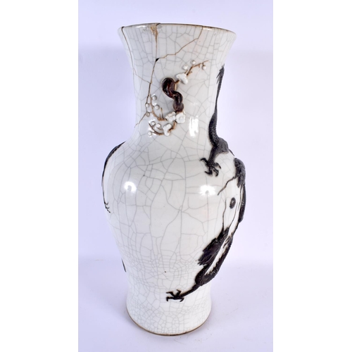 1527 - A LARGE 19TH CENTURY CHINESE CRACKLE GLAZED STONEWARE VASE Qing, overlaid with dragons. 45 cm x 18 c... 