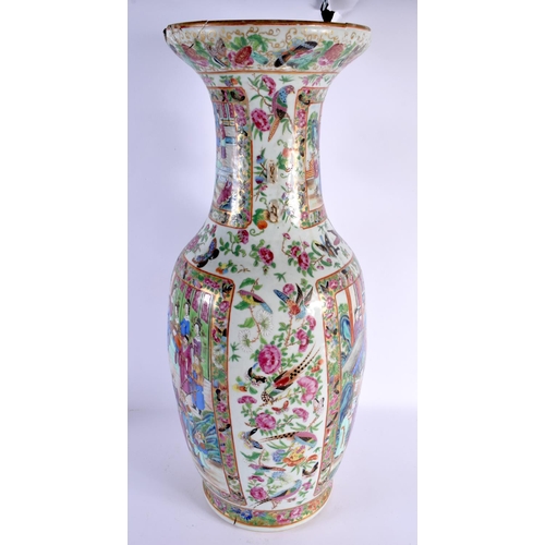 1538 - A LARGE 19TH CENTURY CHINESE CANTON FAMILLE ROSE PORCELAIN VASE painted with figures in interiors. 6... 