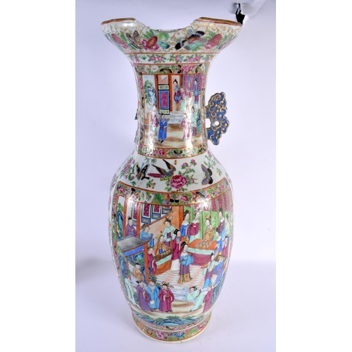 1538 - A LARGE 19TH CENTURY CHINESE CANTON FAMILLE ROSE PORCELAIN VASE painted with figures in interiors. 6... 