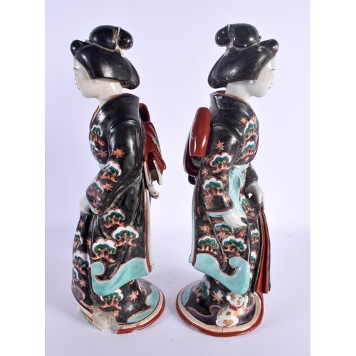 1554 - A LARGE PAIR OF 19TH CENTURY JAPANESE MEIJI PERIOD IMARI FIGURES modelled in robes beside cats. 36 c... 