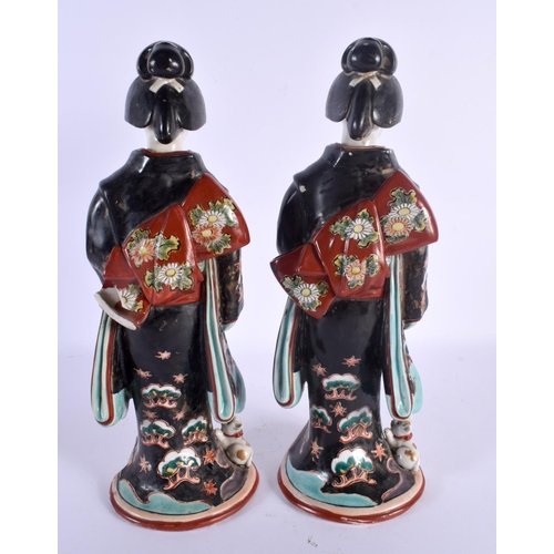 1554 - A LARGE PAIR OF 19TH CENTURY JAPANESE MEIJI PERIOD IMARI FIGURES modelled in robes beside cats. 36 c... 