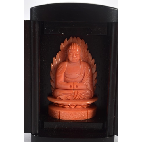 1561 - A FINE EARLY 20TH CENTURY CHINESE CARVED CORAL BUDDHA Late Qing/Republic, within a hardwood shrine. ... 