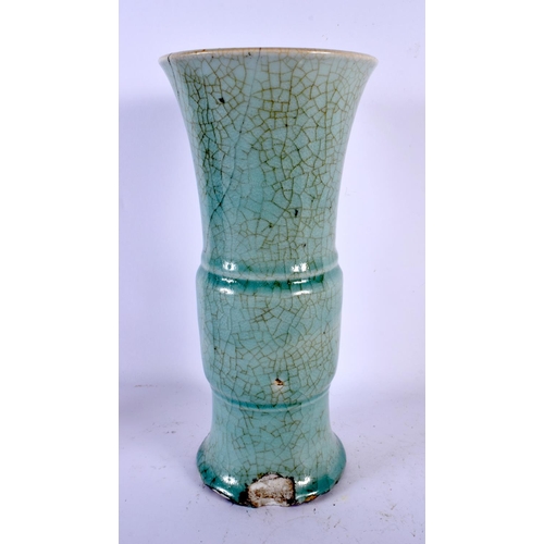 1579 - AN EARLY CHINESE PALE CELADON GLAZED GU FORM VASE Song/Yuan. 30 cm high.