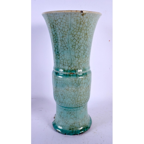 1579 - AN EARLY CHINESE PALE CELADON GLAZED GU FORM VASE Song/Yuan. 30 cm high.