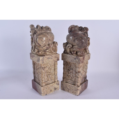 1589 - A LARGE PAIR OF 19TH CENTURY CHINESE CARVED SOAPSTONE SEALS Qing, modelled with beasts and dragons. ... 