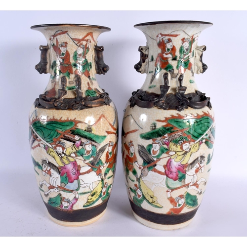 1590 - A LARGE PAIR OF 19TH CENTURY CHINESE CRACKLE GLAZED FAMILLE VERTE VASES painted with warriors in bat... 