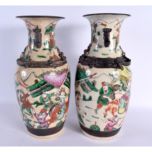 1590 - A LARGE PAIR OF 19TH CENTURY CHINESE CRACKLE GLAZED FAMILLE VERTE VASES painted with warriors in bat... 