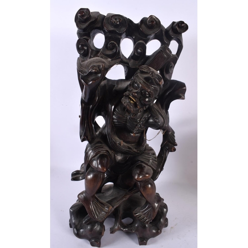 1596 - A LARGE 19TH CENTURY CHINESE CARVED HARDWOOD FIGURE together with a buffalo etc. Largest 34 cm high.... 