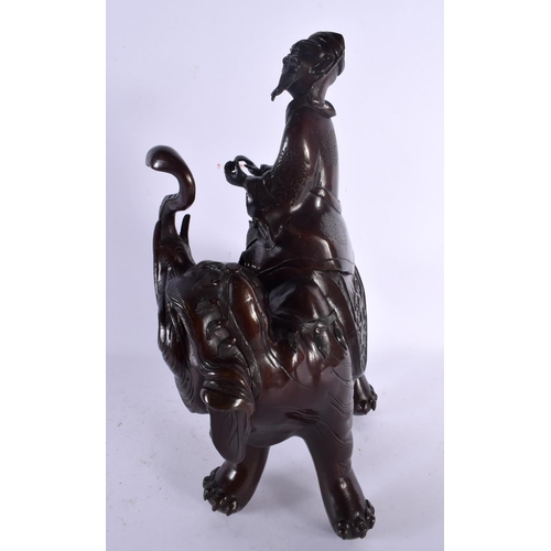 1599 - A LARGE 19TH CENTURY JAPANESE MEIJI PERIOD BRONZE OKIMONO modelled as a male upon an elephant. 37 cm... 